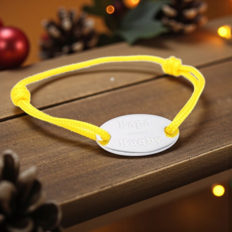 Yellow cord bracelet with oval medallion engraved "papa rugby".
