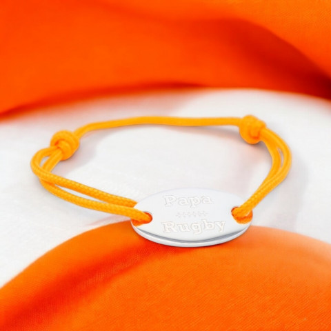 Orange cord bracelet with oval medallion engraved "papa rugby".