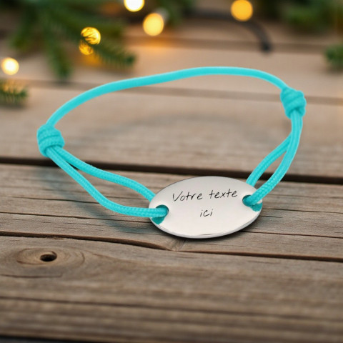 Turquoise bracelet with oval medallion engraving