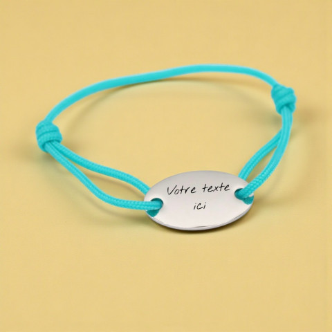 Turquoise bracelet with oval medallion engraving