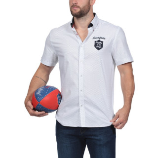 Rugby à la Plage white summer shirt, both chic and relaxed with its embroideries. It will assure you a genuine summer look !