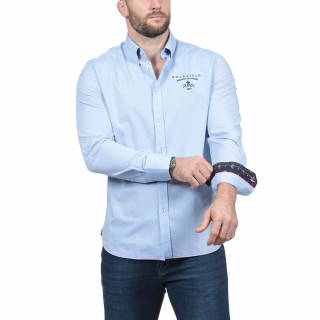 Chemise manches longues en coton bleu avec logos brodés poitrine et dans le dos.Disponible du S au 5XL.
